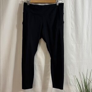 Athleta Cropped Leggings Black Side Pockets Zipper laser cut holes medium petite
